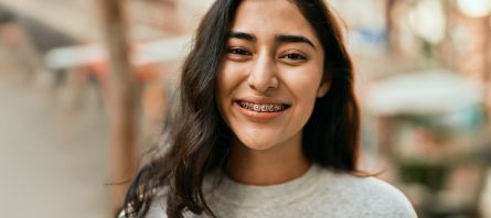Smiling teenage girl with braces