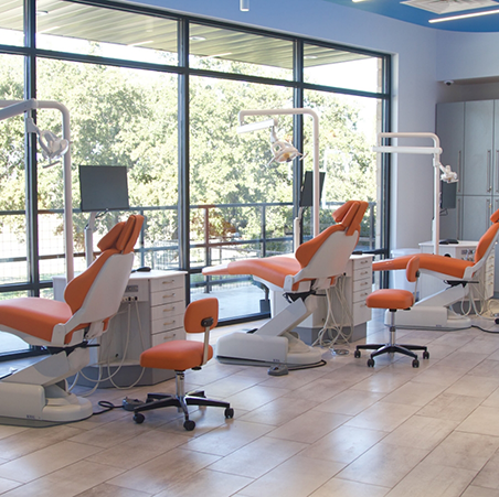 Row of orthodontic treatment chairs